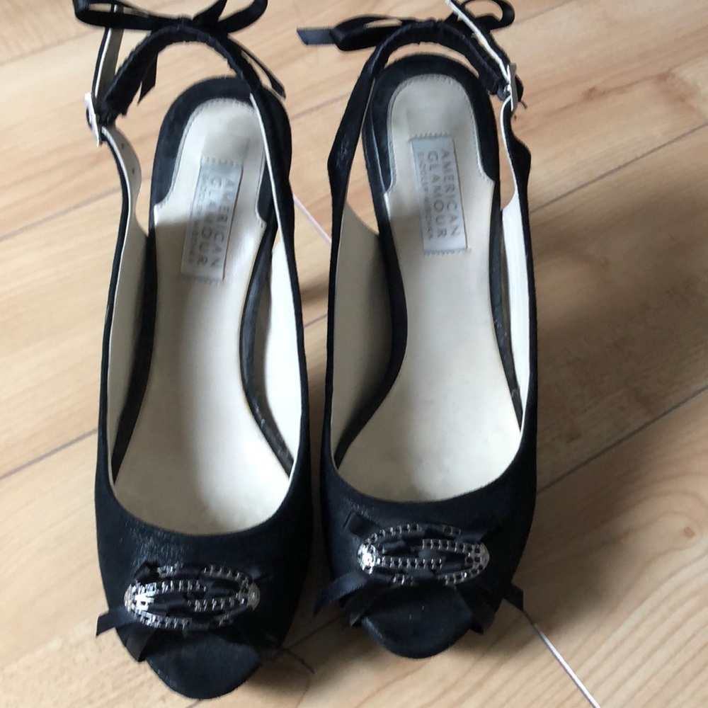 High heeled black pumps